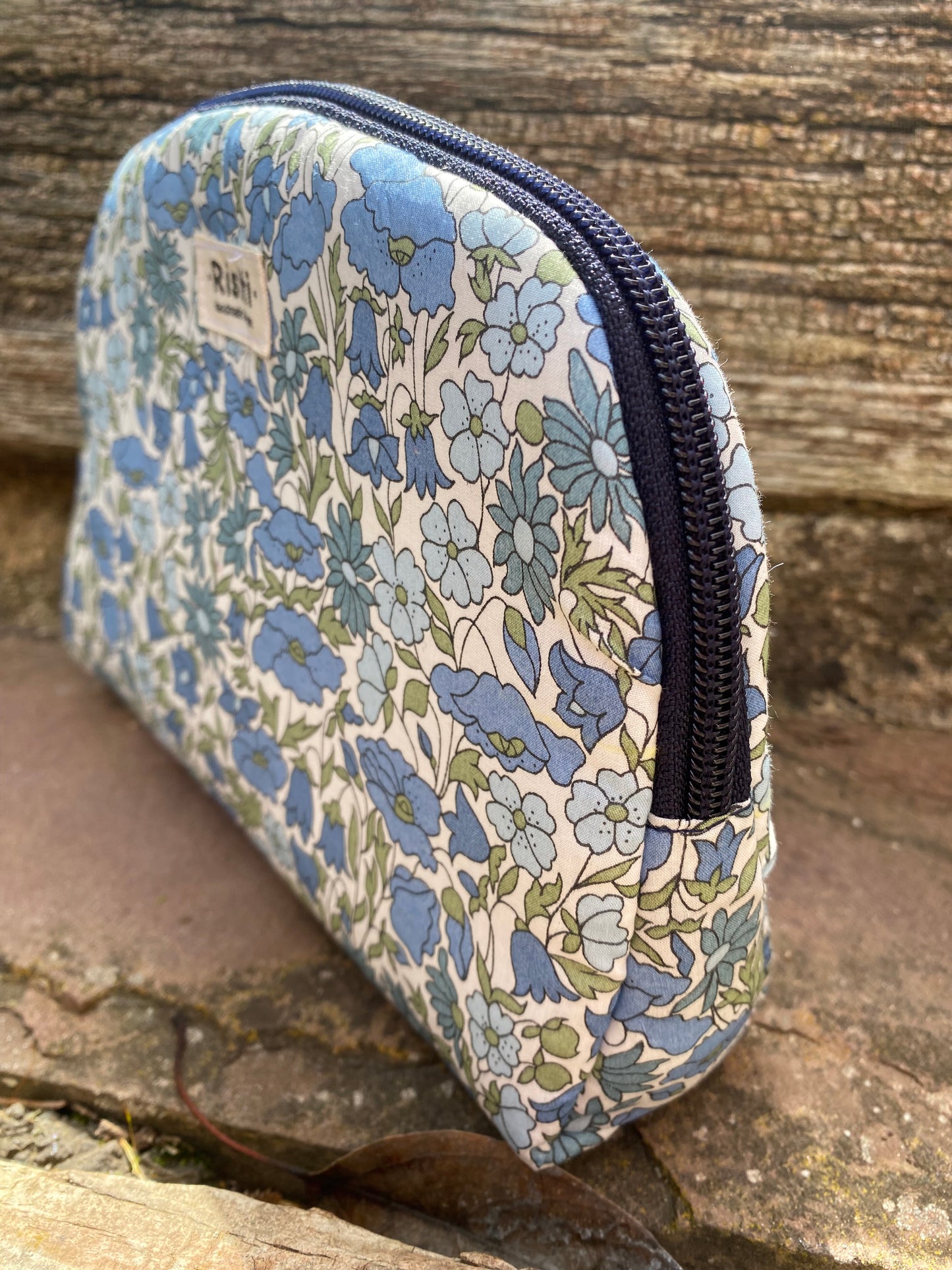 Neceser media luna Poppy Blue