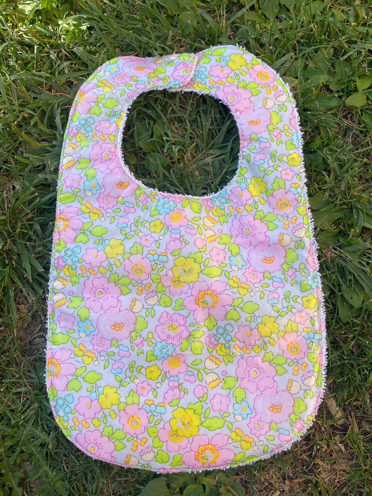 Babero plastificado Betsy Fluor
