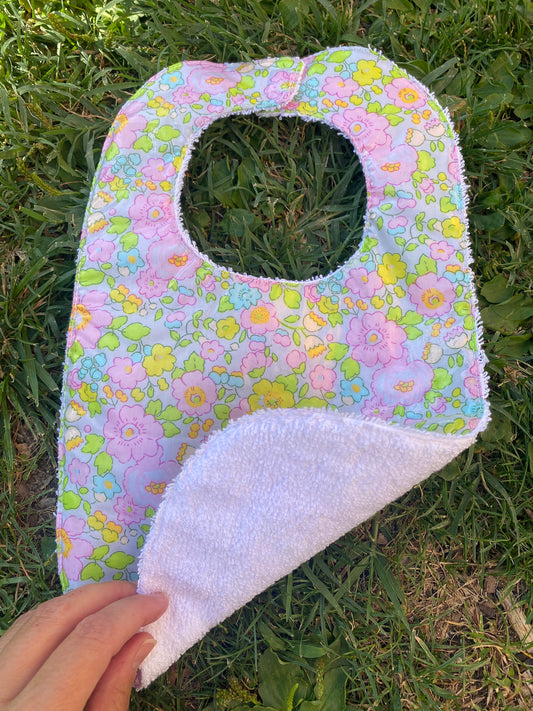 Babero plastificado Betsy Fluor